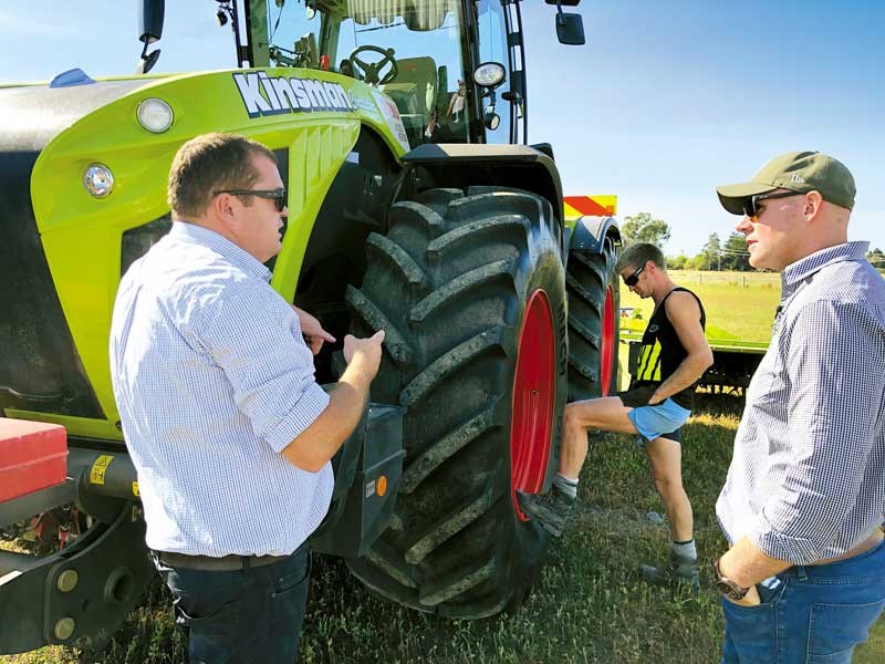 Deep in discussion on the tractor features