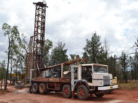 Mining drill rig on truck bed