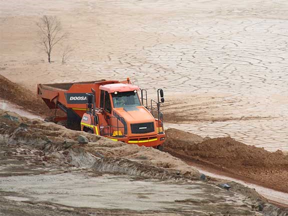 Doosan DA40 articulated dump truck on dirt road