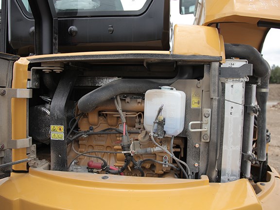 This machine runs a four-cylinder Cat C2.4 engine which produces 40.2 horsepower (30kW).