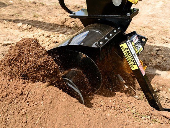 The Digga Bigfoot trencher's barrel and spoil auger for discharging trench spoil is a great innovation.