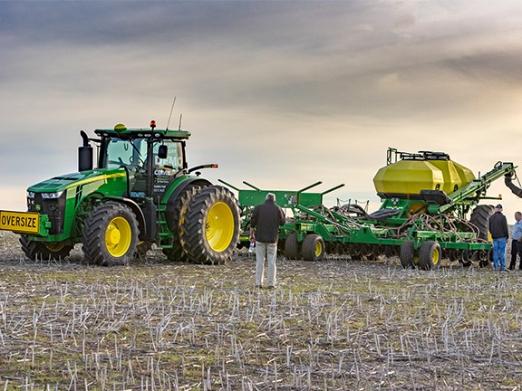 The combo of a John Deere 8320R Row-Crop tractor, 1890 No-Till disc air seeder and 1910 triple-bin air cart we used for testing