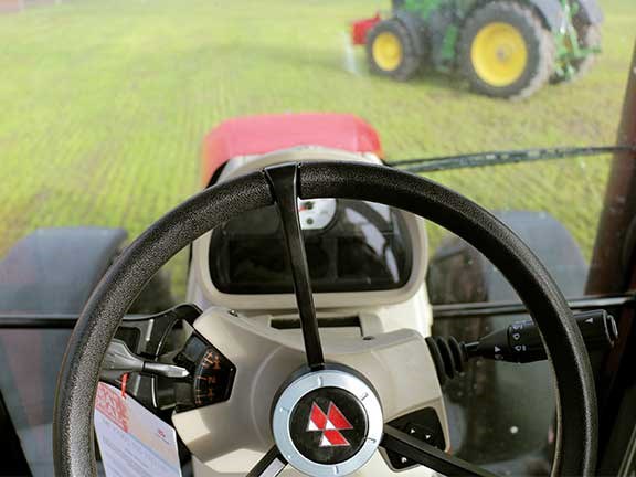 A well-laid-out dash incorporates dials and a digital display to show the tractor’s vital stats