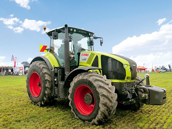 The Claas Axion 930 front on