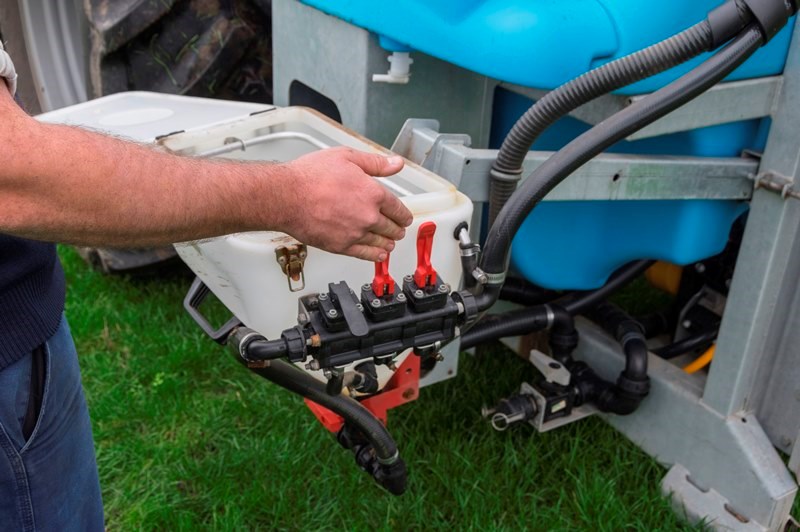 The two red levers are to active hopper rinse and dry chemical mixing