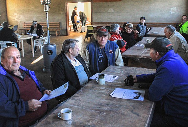 From left, Tony Muscat of Yass, John Scott of Wodonga, Paul Flanagan of Wagga Wagga and Jimmy Townsend of Yass enjoy breakfast at Tumblong before the road run.