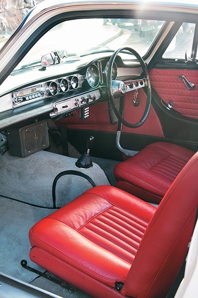 The red leather interior is in as-new condition
