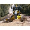 A contractor-specification Komatsu GD655A-5 grader.