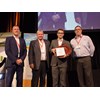 Australian Bus and Coach Underwriting business development manager Tony La Rocca, BIC president Wayne Patch, and Iveco national manager Steve Heanes present the Innovation and Environment award to TAG chief operations officer John Calabro (third from left)