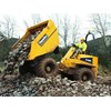 A 10-tonne dumper tipping rock