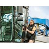 Georgie Lindsay climbs into a New Holland grape harvester FMG Young Farmer of the Year