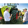 Deep in discussion on the tractor features