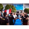 Vista project manager Jessica Lindholm welcomes one of the Latin American teams on the Volvo blue carpet.