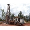 Mining drill rig on truck bed