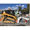 Cat skid steer loader with EasyGrade attachment