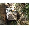 Nissan Patrol 4x4 being winched from gap