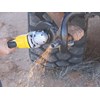 Man using angle grinder