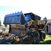 The Cat 242B skid steer loader in work mode.