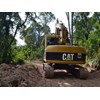 The working environment includes thick trees and scrub, with lantana up to 5m in height.