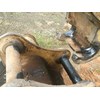Excessive wear on the bucket pins and quick hitch tongue.