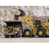 The Cat 994K can load 150, 200 and 250 short ton mining trucks in one full pass less than the previous model.