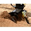 The Digga Bigfoot trencher's barrel and spoil auger for discharging trench spoil is a great innovation.