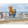 The Fiori DB 180 self-loading concrete mixer at work on the island of Manihiki, Cook Islands.