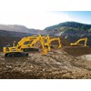 A lineup of talented Komatsu earthmovers, including the HB215LC-1 and HB335LC hybrids.