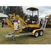 Komatsu was showing off a tradie deal on its PC18MR-3 mini excavator — digger, KGA half hitch, 300mm KGA bucket and 2.4-tonne Sureweld trailer from $25 a day.