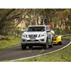 Nissan Navara towing excavator