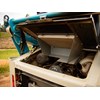 A tilt-up cabin, 180-degree-opening rear grille and raised engine hood provide excellent service access.
