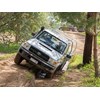 Toyota Landcruiser 70 series in offroad ditch