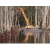 The 40-tonne excavator pulling 6m sheet piles.