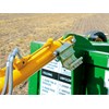 A ram on the drawbar with spacer shims is used to keep the machine level