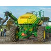 The John Deere 1910 Air Cart behind an 8320R tractor and an 1890 No-Till Air Drill