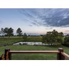 The stunning green paddocks from the deck