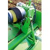 Drive is transferred to the outer gearboxes through a shaft and a cam clutch to prevent damage