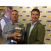 Agronomist Greg Rummery (left) receives the prestigious Brownhill Cup from Commonwealth Bank regional and agribusiness banking general manager Tim Harvey.