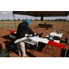 Attaching the wings to the fuselage before flight