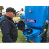 BA Pumps and Sprayers regional manager Daniel Peacock lifts the lid on the new BA LS1300 linkage sprayer’s improved fold away chemical induction hopper, with container rise