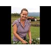 Karen tends to the raised beds.