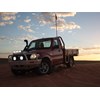 Mahindra pik up ute in desert sunset