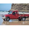 Our very red Mahindra 4x4 arrived with just 60km on the clock, a powder-coated steel tray and a bull bar glinting in the sun