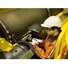 Worker repairing crane