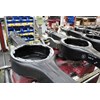 Empty diff housings after the suspension brackets have been welded onto the axles.