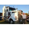 Peter Ovens with one of the many big bonneted Kenworths at the show.