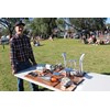 Volunteer Mathew Cook with the life like trophies.