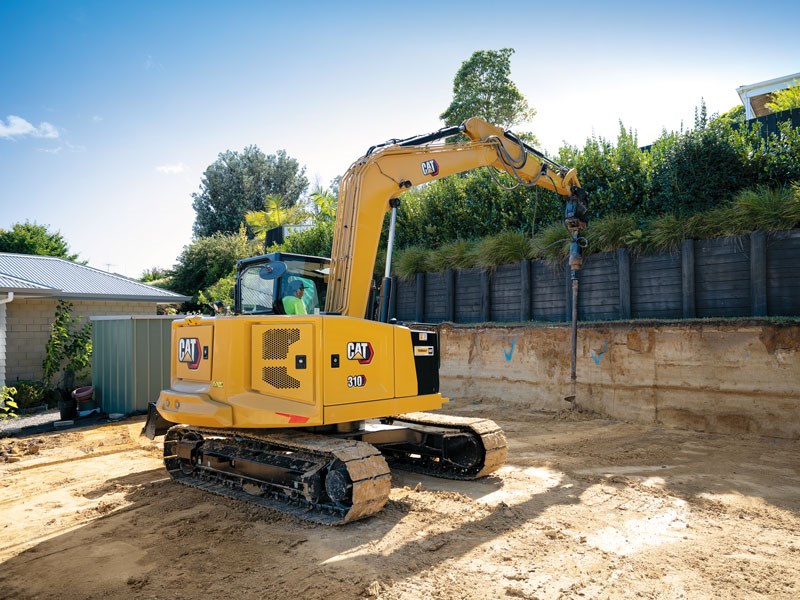 Cover story Cat 310 mini excavators