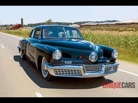 Preston Tucker loading luggage in trunk  Classic cars, American classic  cars, Old vintage cars