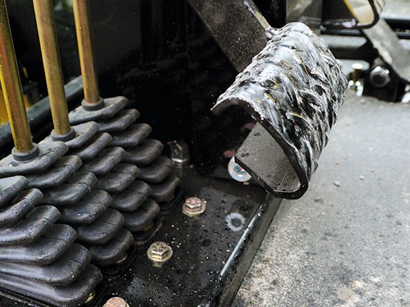 The high-set brake pedal is one of the few negatives of the NorAm 65E grader.